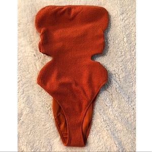 Orange one-piece bathing suit